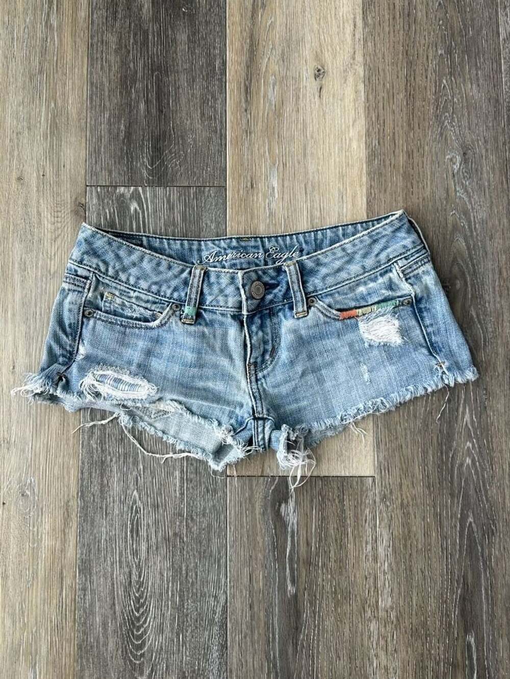American Eagle Distressed Denim Micro Shorts Rainbow Stitch Size 0|25"